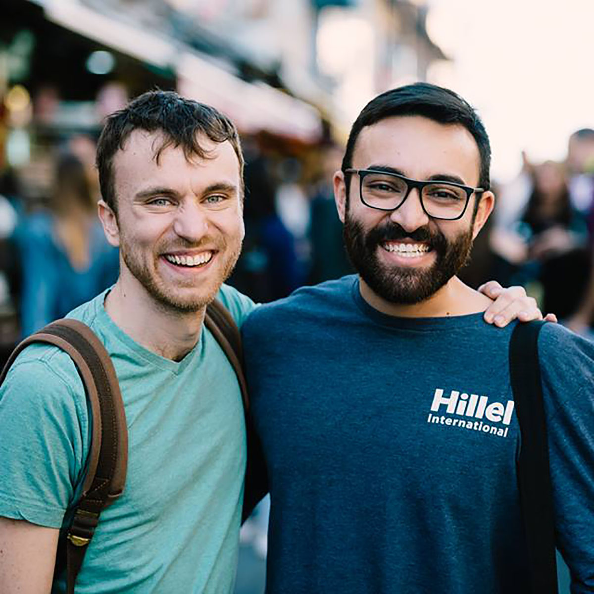 Two Hillel students share a laugh